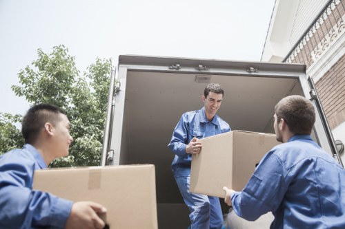 Moving truck loading household items during house removals in Catford