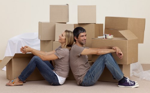 Loading boxes and furniture into a van for a Catford relocation
