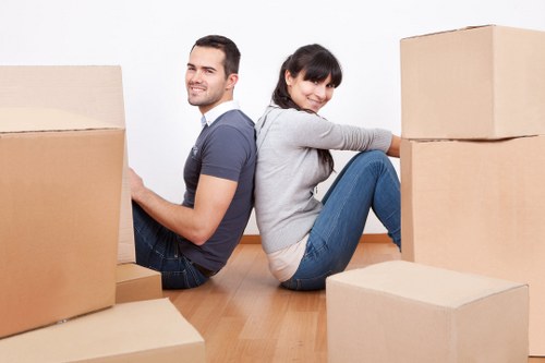 Local removals team handling furniture in Catford