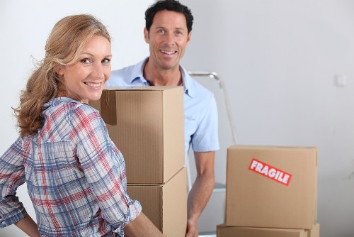Removals team safely transporting fragile items in Catford
