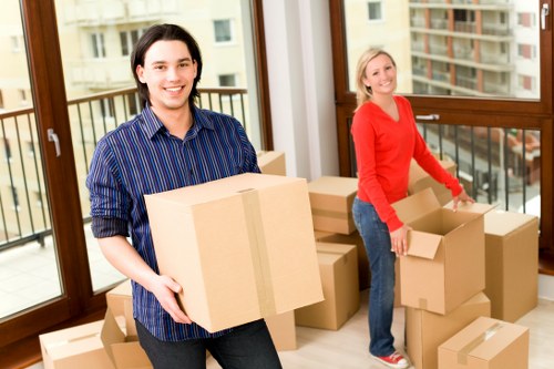 Professional movers handling a compact flat relocation in Catford
